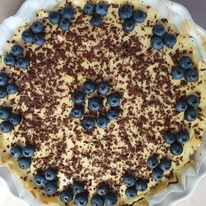Fotorecept s podrobnym postupom na cheesecake so struhanou cokoladou a ovocim